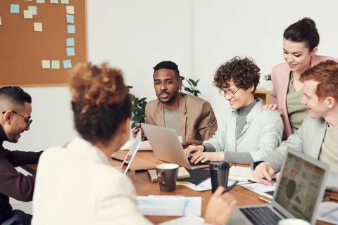 Mentor guiding an emerging creative professional